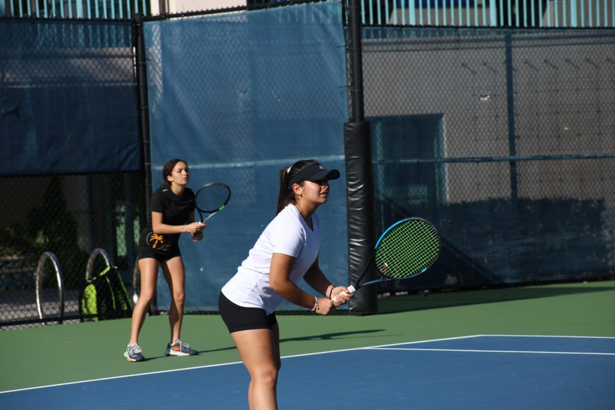  Freshman Paula Guerrero and sophomore Yara Korse team up in a doubles match against Riviera. 