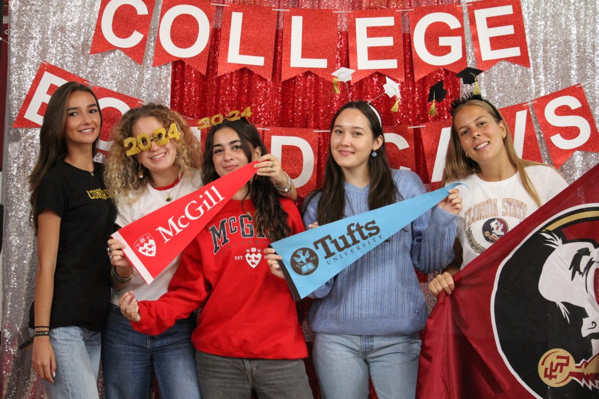Concordia. McGill. Tufts. FSU. Just a couple of the many universities seniors committed to. Each senior slowly made their way to the booth, celebrating their future school pride.