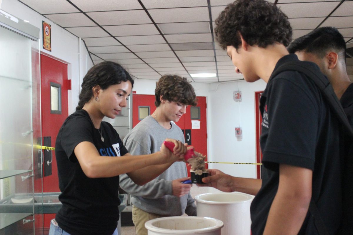 Junior Mateo Blaschke is excited as he waits for his ice cream to be served.