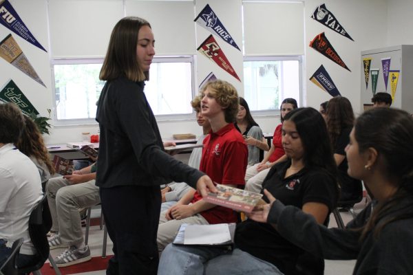 College Assistance Advisor Ms. Sanz passed out brochures to the students to help answer a variety of their questions, ranging from locations to acceptance rates.