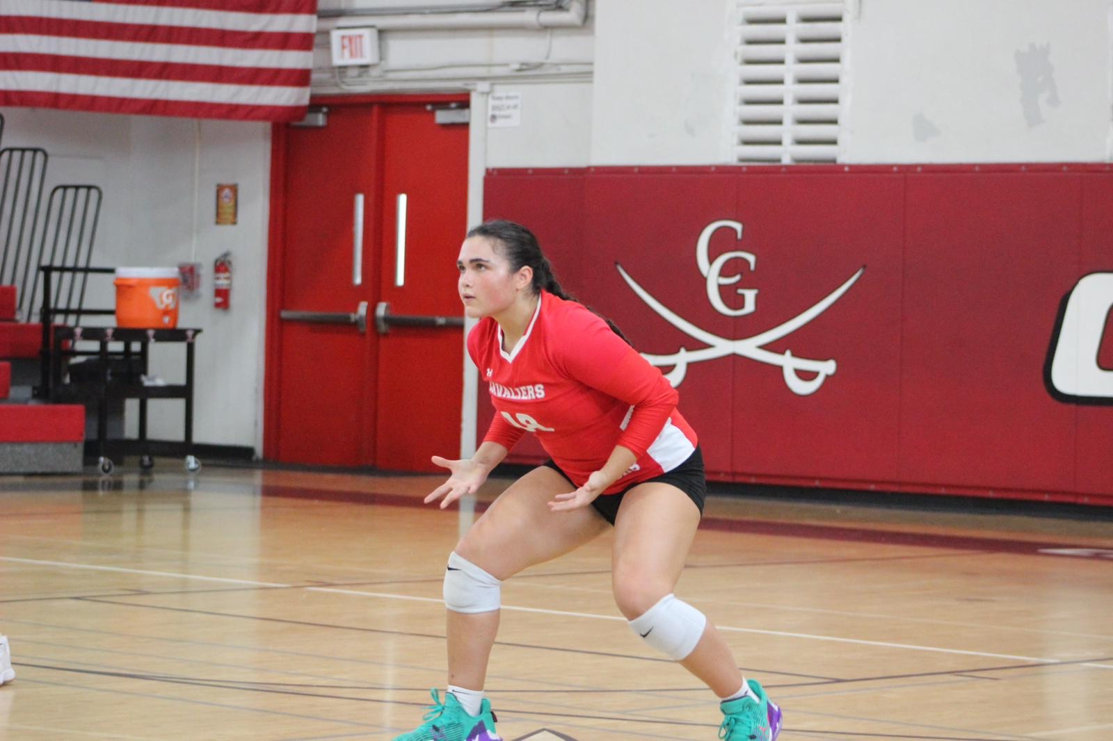 Gables Serve Their Way to Victory Against Ferguson