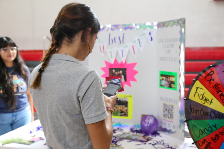 Scanning the QR code in order to join Best Buddies, students were also able to spin a wheel and win a prize. 