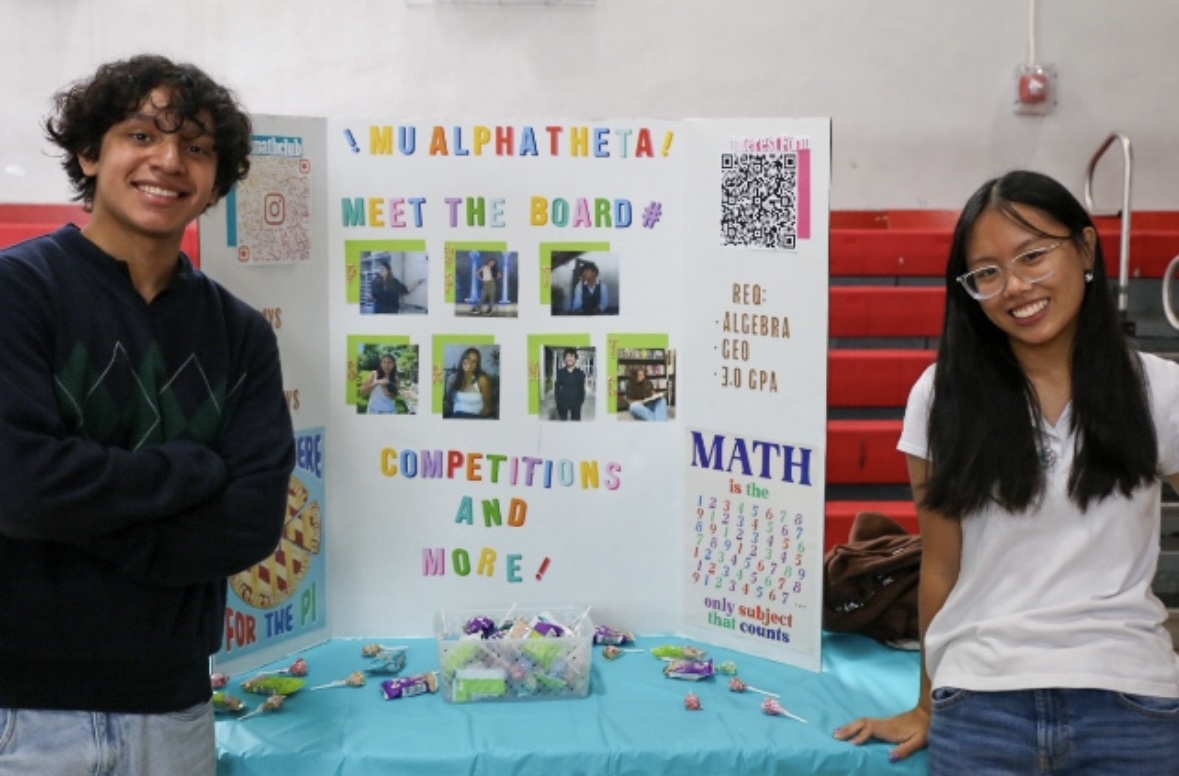 Seniors Tiffany Beh and Bryan Martinez proudly stand by their stand for Mu Alpha Theta, urging fellow math-lovers to join. 