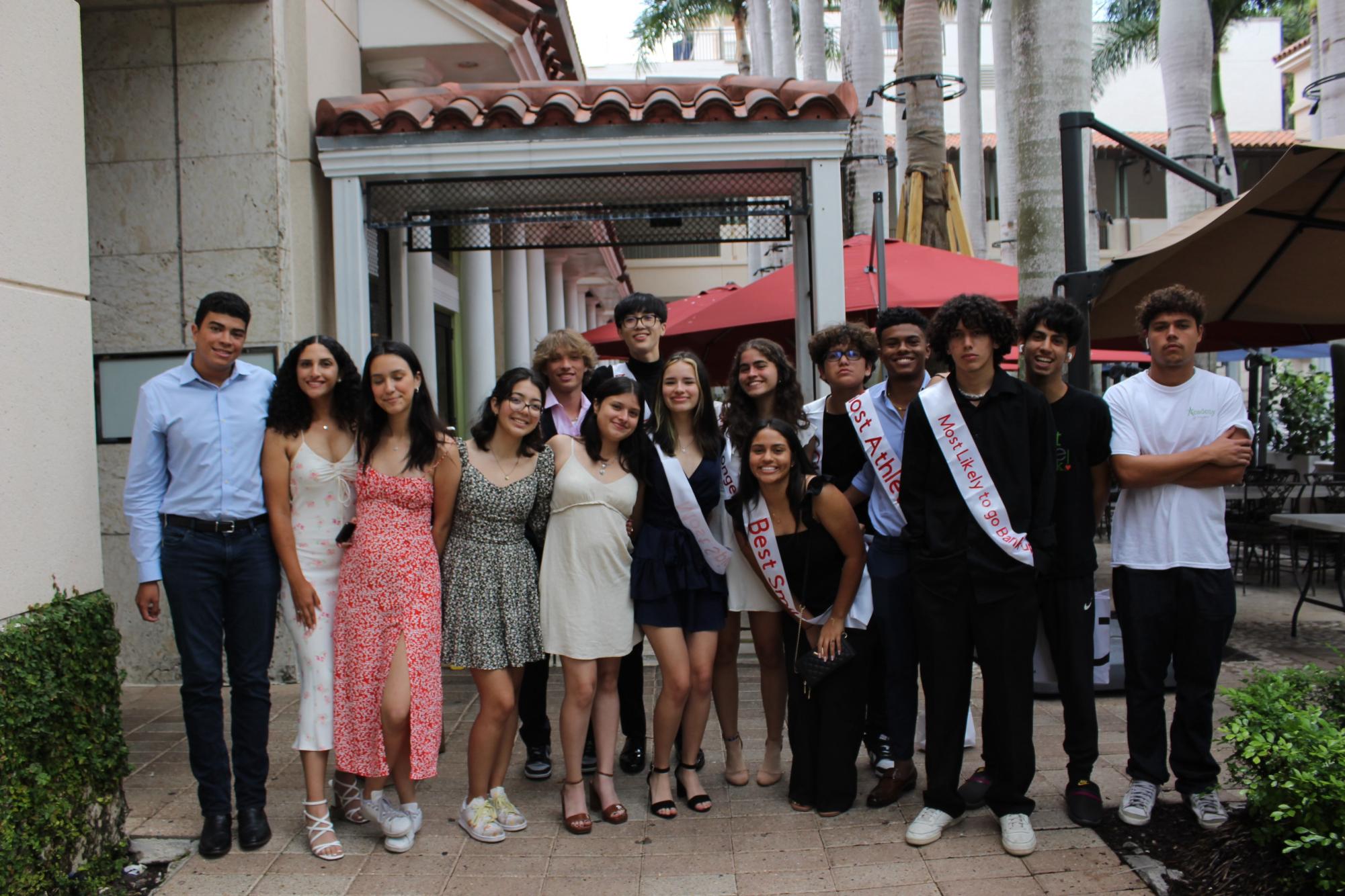 Enjoying some of their last moments together, AOF seniors pose for a photo reminiscing on their high school experience.