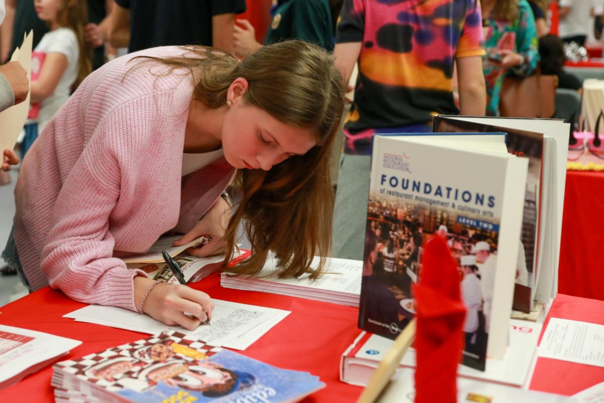 Teachers encouraged incoming students to sign up for Advanced Placement classes that earn students college credits for passing. 