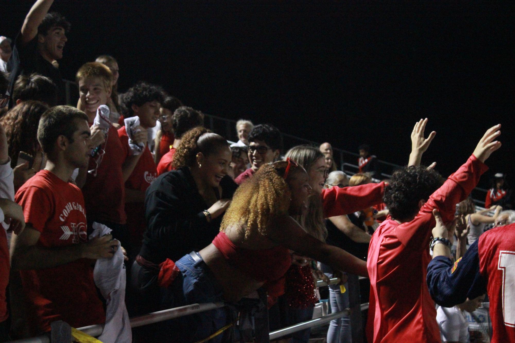 Gables Football Players and Cheerleaders Close the Season With a Win