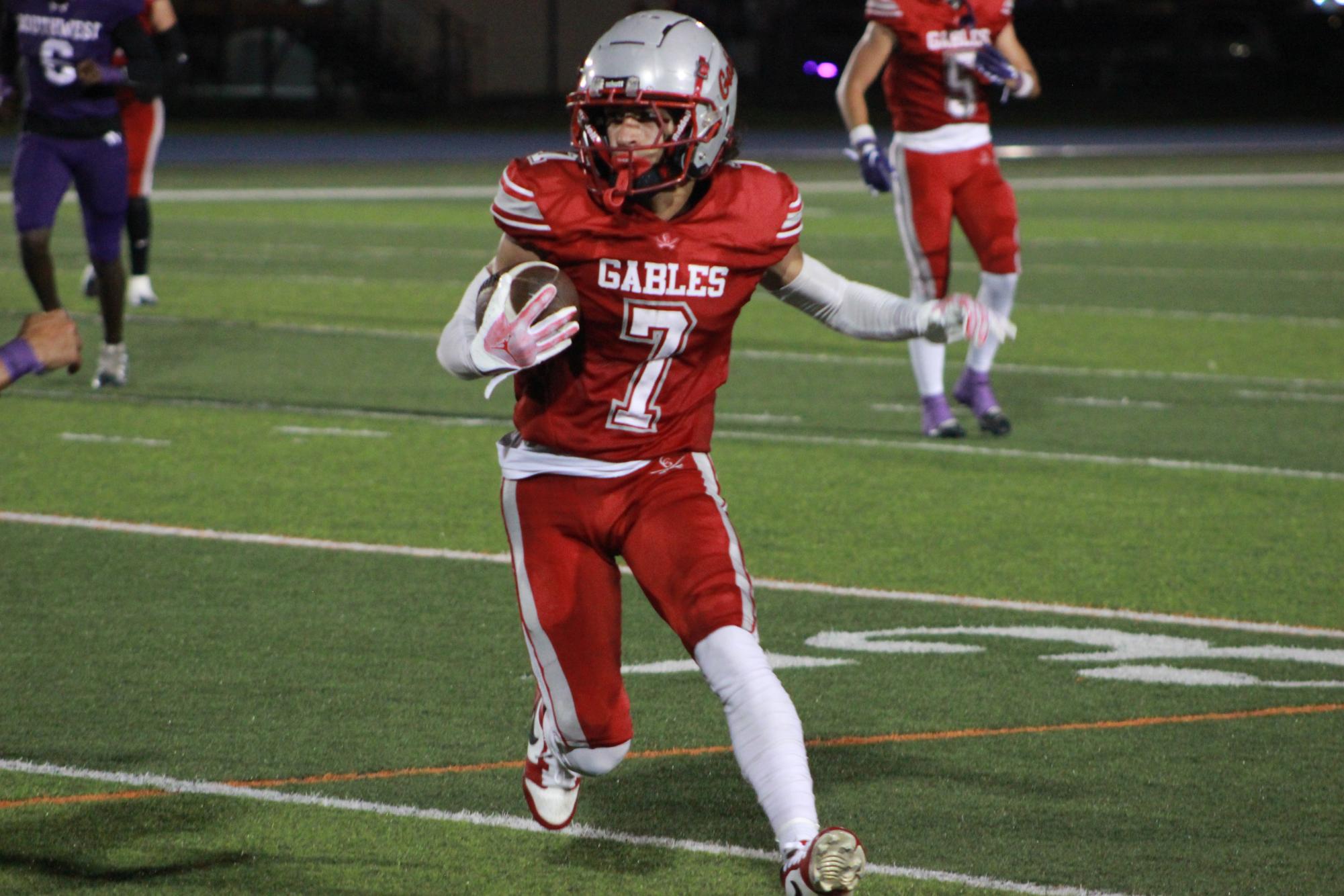 Gables Football Players and Cheerleaders Close the Season With a Win