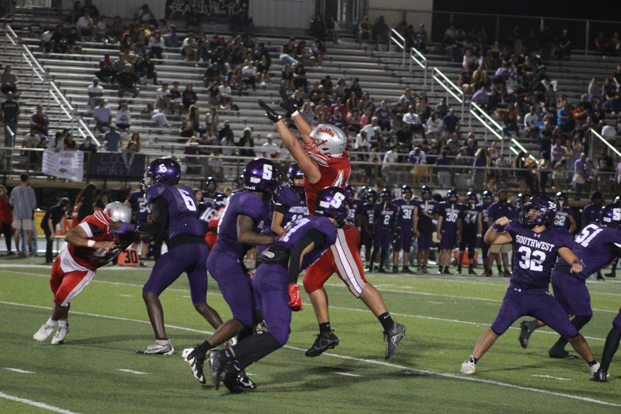 Gables Football Players and Cheerleaders Close the Season With a Win