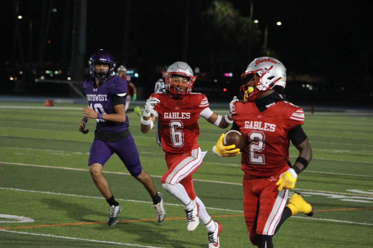 Senior Zion Chery makes his way towards the end zone as the Cavaliers set the tone for the game. 