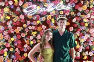 Seniors Evan Noval and Melissa Hernandez were crowned to the Gables Homecoming court. Amidst the flowery backdrop, the new king and queen posed together. 