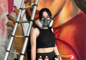 Painting has become a natural instinct for Ugarte. Grabbing spray paint and her mask, she is transported to another world, one of artistic expression. 