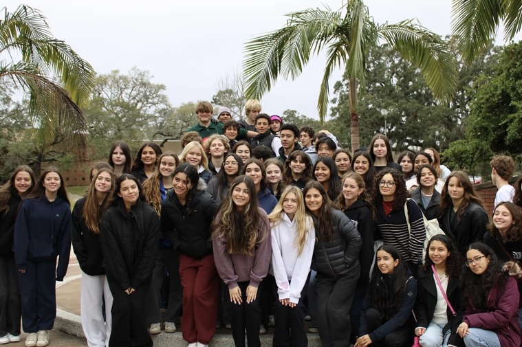 Juniors from the Class of 2026 gather around to capture a photo at the University of Central Florida, reminiscing on the memories and information gained on their journey. 